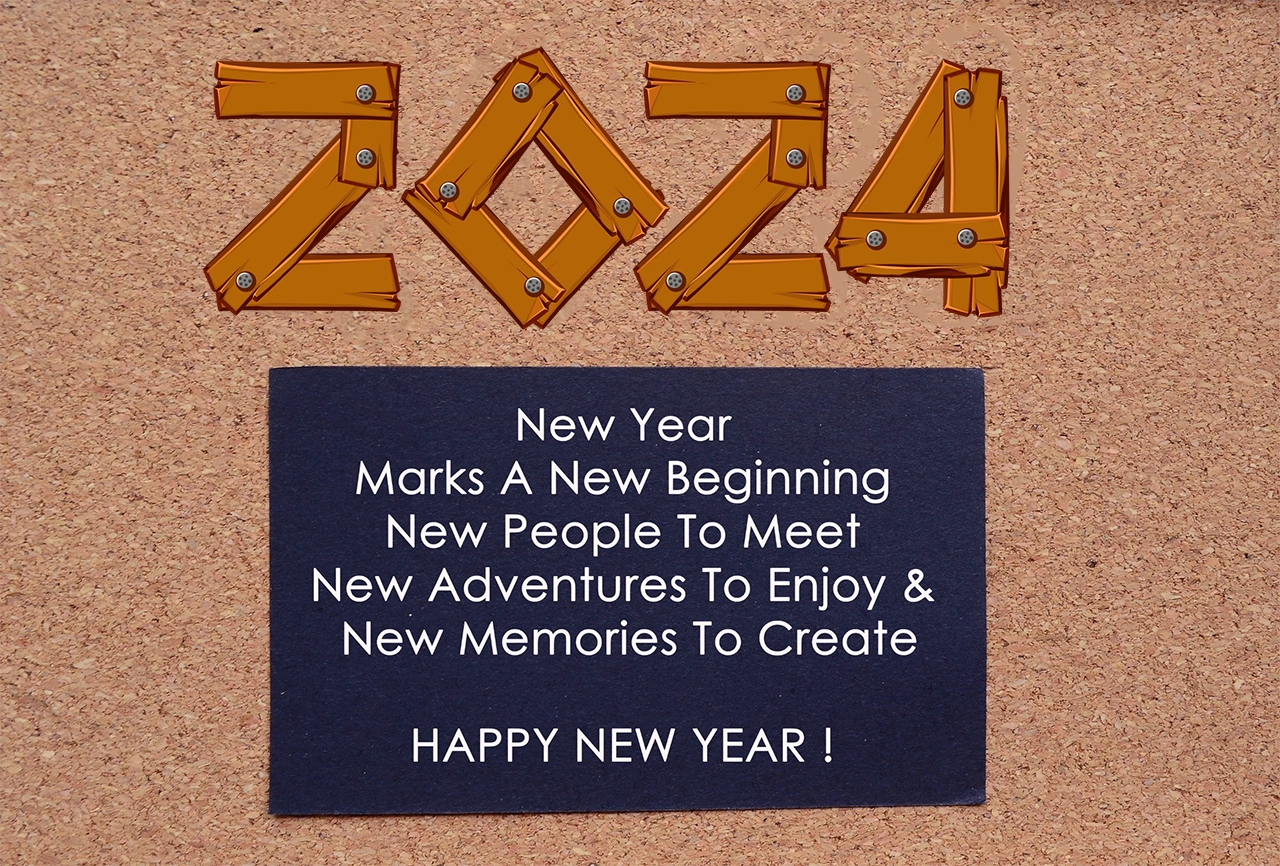 New Year Marks A New Beginning New People To Meet New Adventures To Enjoy & New Memo ^ New year quote for 2024 on black notepad with wooden background